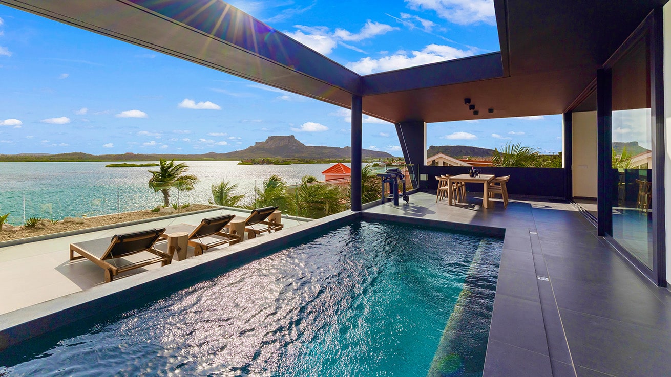 The Wave Villa rooftop pool overlooking the water